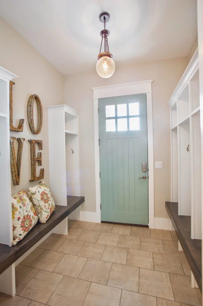 Love this mudroom with the thick wood bench and tall cubby lockers. | 100+ striking Mudrooms and Entryways at Bekob.com
