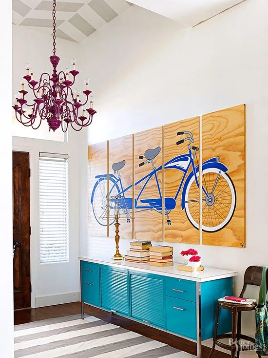 This foyer makes such a big statement on entering the house. Patterned ceiling, huge statement art (painted on plywood!) and that turquoise metal cabinet is solid. | 100+ striking 