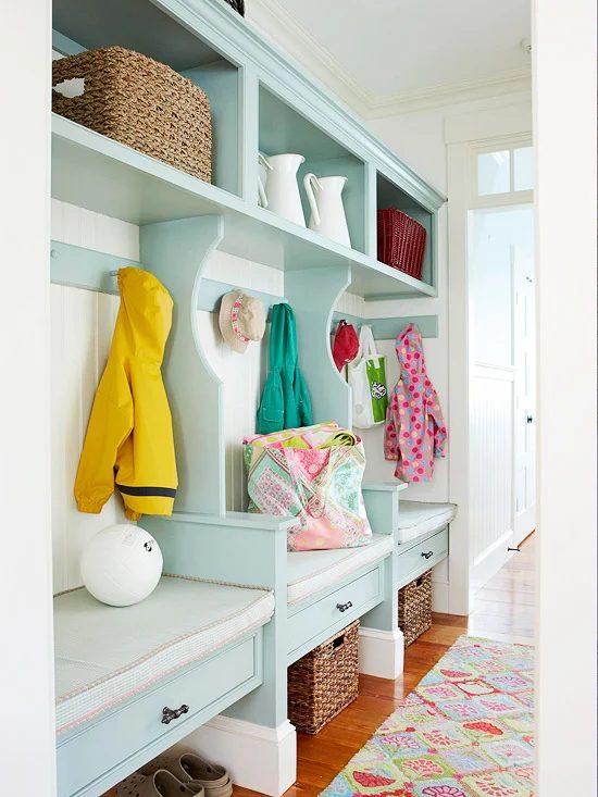 Fun striped cubbies for entryway, love the light turquoise aqua color (and the rug!) | 100+ striking Mudrooms and Entryways at Bekob.com