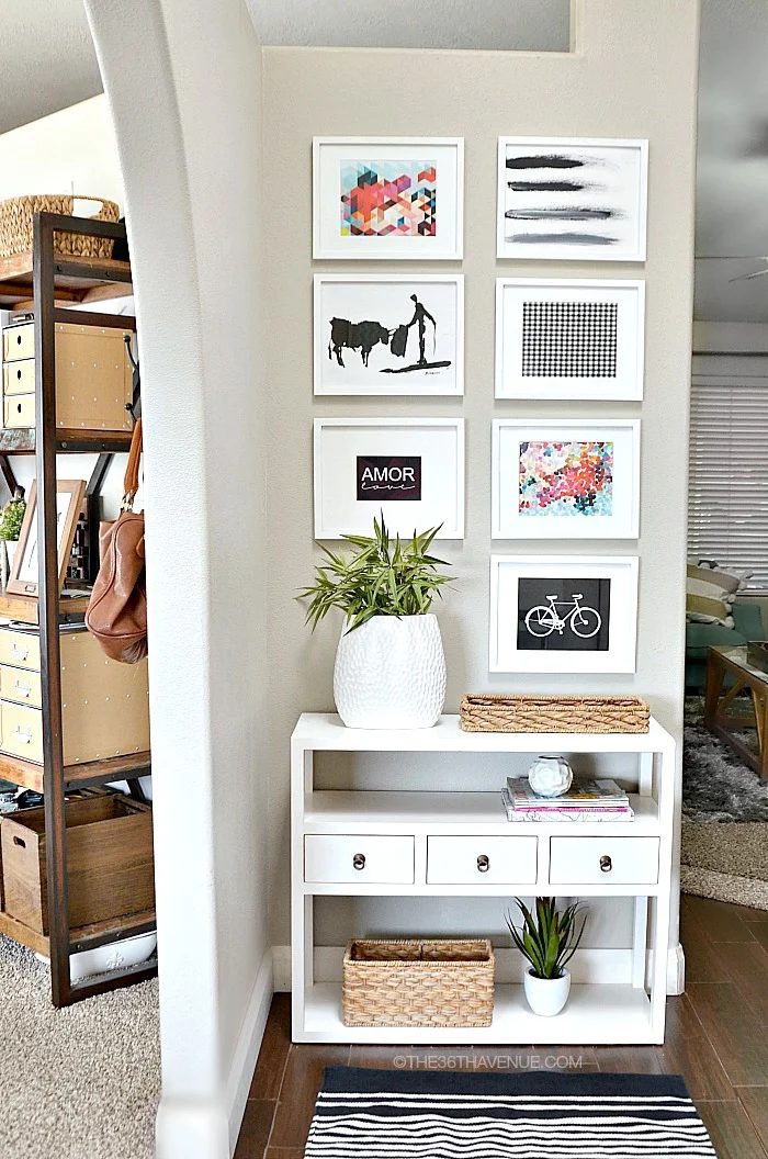 Cute entryway decor! Love the prints | 100+ striking Mudrooms and Entryways at Bekob.com
