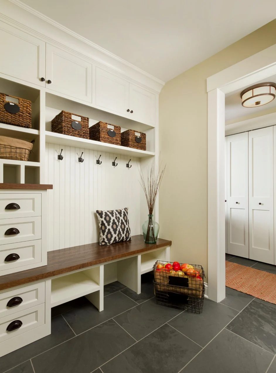 large entryway, love the built-in drawers and shelves and cubbies with the wood bench | 100+ striking Mudrooms and Entryways at Bekob.com