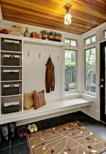 Mudroom Basket Storage, floating bench with cubbies and a shelf and hooks -- everything we need in the entryway! | 100+ striking Mudrooms and Entryways at Bekob.com