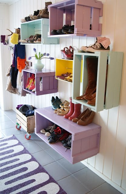 Such a great entryway, colorful crates hung on the wall for shoe storage | 100+ striking Mudrooms and Entryways at Bekob.com