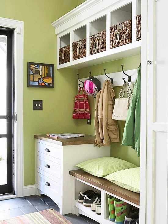 This green mudroom is well fitted. Built-in storage for shoes, plus drawers and hooks and cubbies overhead. | 100+ striking Mudrooms and Entryways at Bekob.com