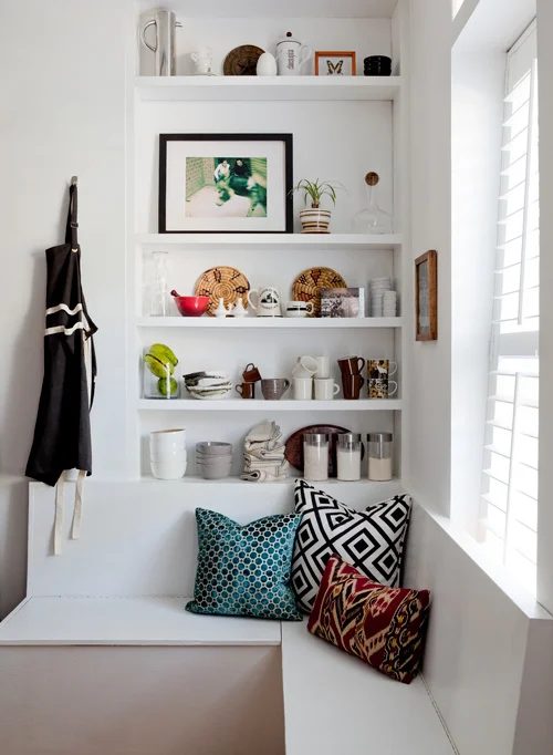 Designer Fluff via Decor8 - corner window seat with built-in shelves via @Bekob