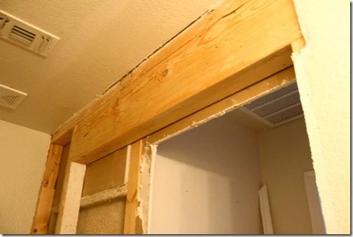 Pocket door installation, install a new header and jack and king studs on Bekob.
