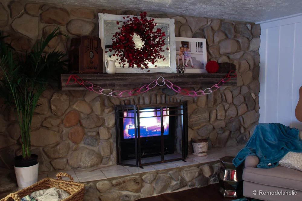 Valentines mantel and TV in fireplace (7 of 8)