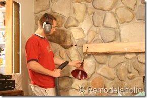 Installing a wood mantel on a stone wall (34)