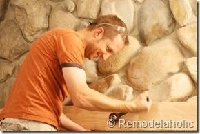 Installing a wood mantel on a stone wall (43)