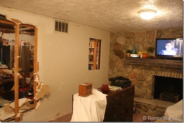 Installing a wood mantel on a stone wall (82)