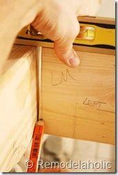 Installing a wood mantel on a stone wall (51)
