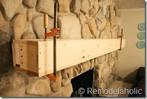 Installing a wood mantel on a stone wall (71)