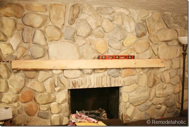 Installing a wood mantel on a stone wall (20)