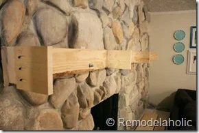 Installing a wood mantel on a stone wall (63)