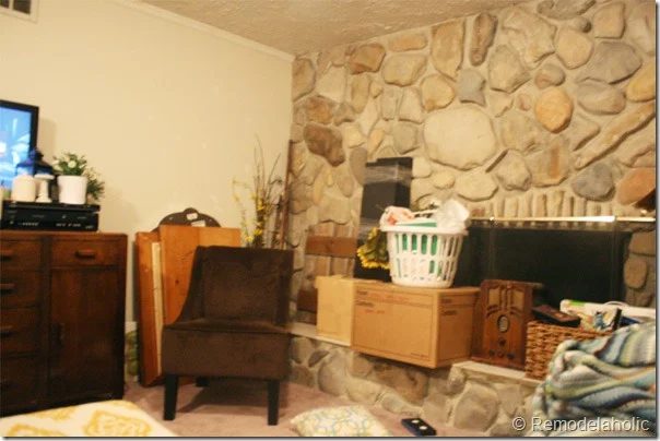 Installing a wood mantel on a stone or brick fireplace wall before
