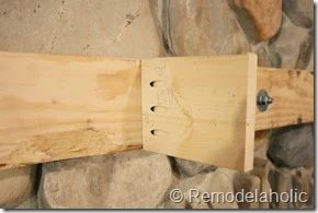 Installing a wood mantel on a stone wall (61)