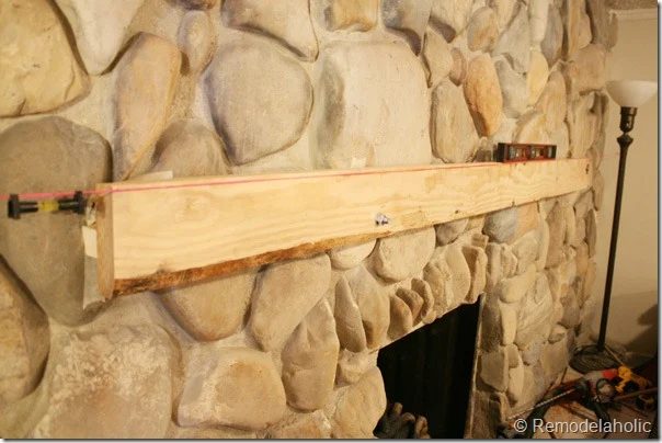 Installing a wood mantel on a stone wall (23)