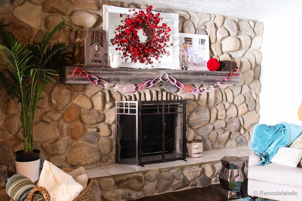 Valentines mantel and TV in fireplace (1 of 8)