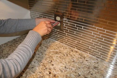 reinstalling switch plates over a stainless steel backsplash, construction2style on @Bekob