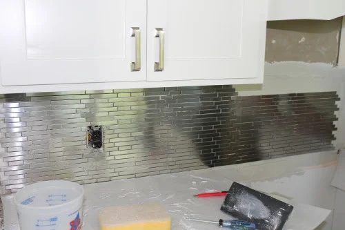 white kitchen remodel with stainless steel tile backsplash, construction2style on @Bekob