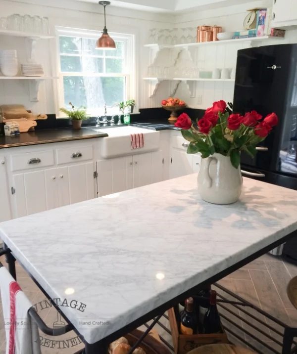Marble top and open bottom completely transform the island in this white kitchen!, by Vintage Refined featured on @Bekob