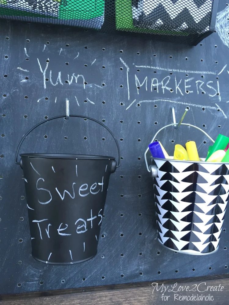 So smart! A chalkboard pegboard command center. Versatile and straightforward for organizing the family!