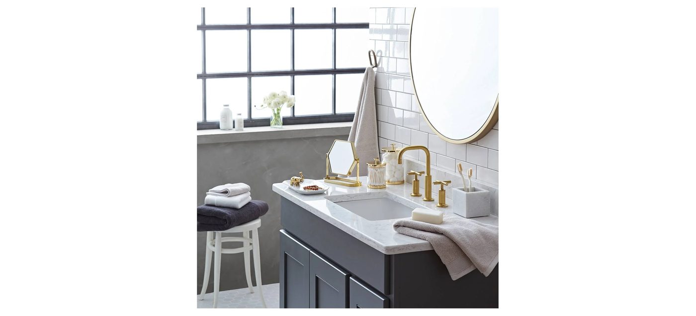 Round Mirror In A Bathroom