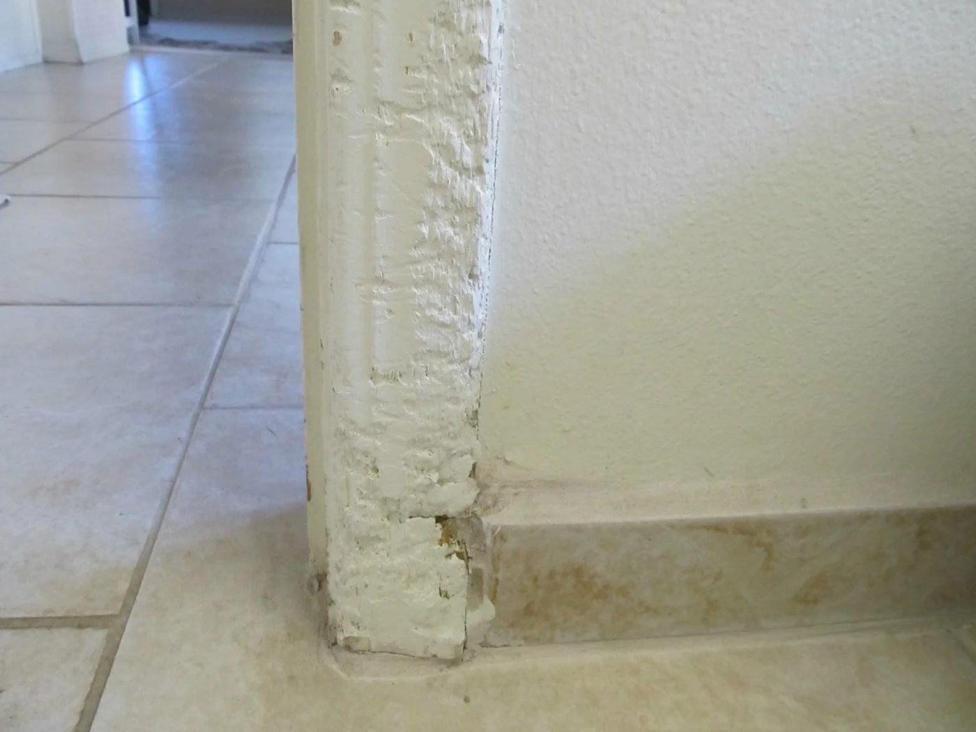 damaged trim in the laundry room, The Pin Junkie featured on Bekob.com