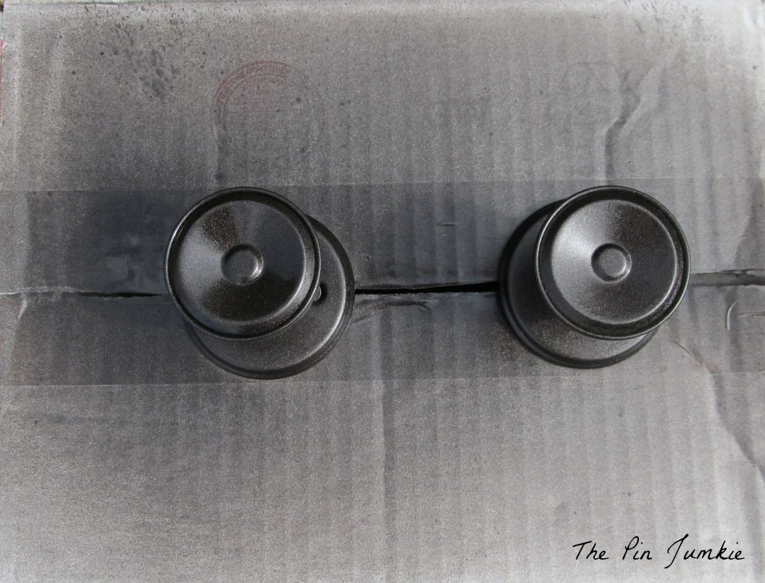 update laundry room door knobs with metallic spray paint, The Pin Junkie featured on Bekob.com