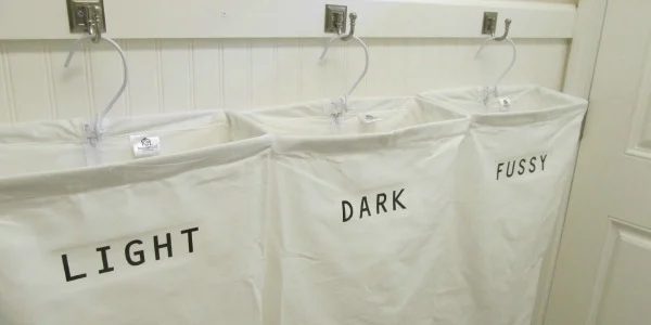 Laundry Room Makeover with Personalized Hanging Laundry Bags