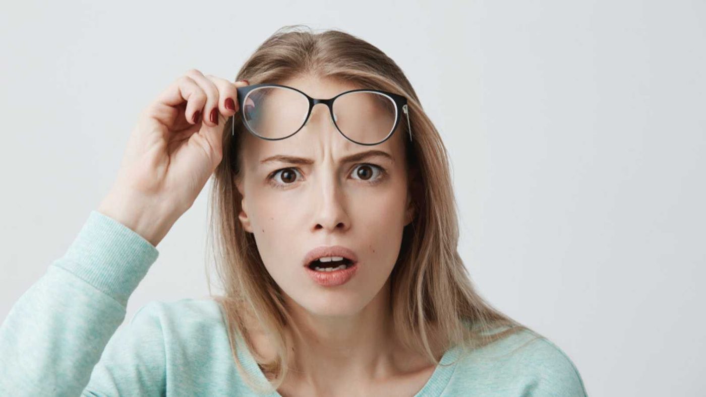 Woman Shocked And Removing Specs 1