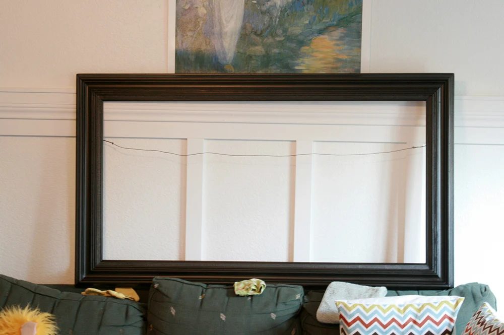 spray painted black picture frame