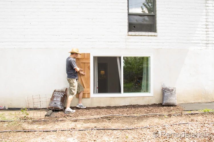 install Handmade wood shutters