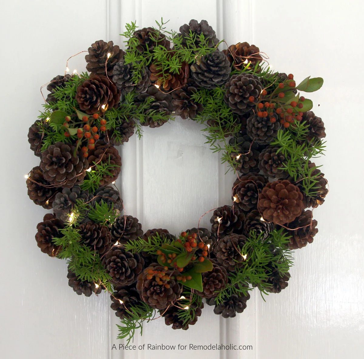 Handmade Pine Cone Wreath With Pine Sprigs And Berry Picks And Fairy Lights, Bekob