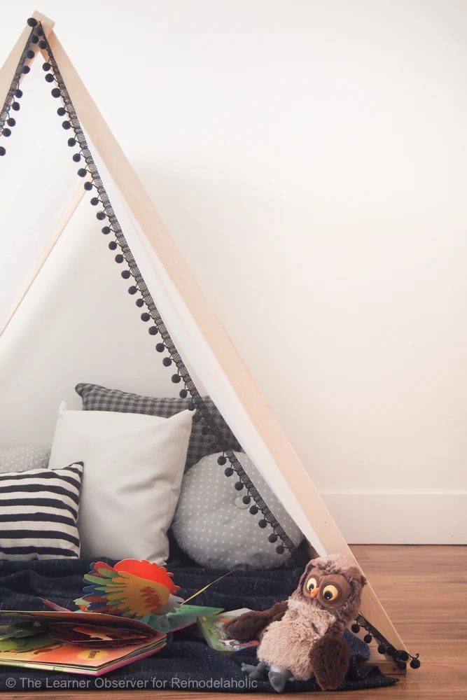 This is the easiest Handmade kids tent! It takes just a few supplies and under an hour to make a special play area that will create hours of fun. No sewing required!