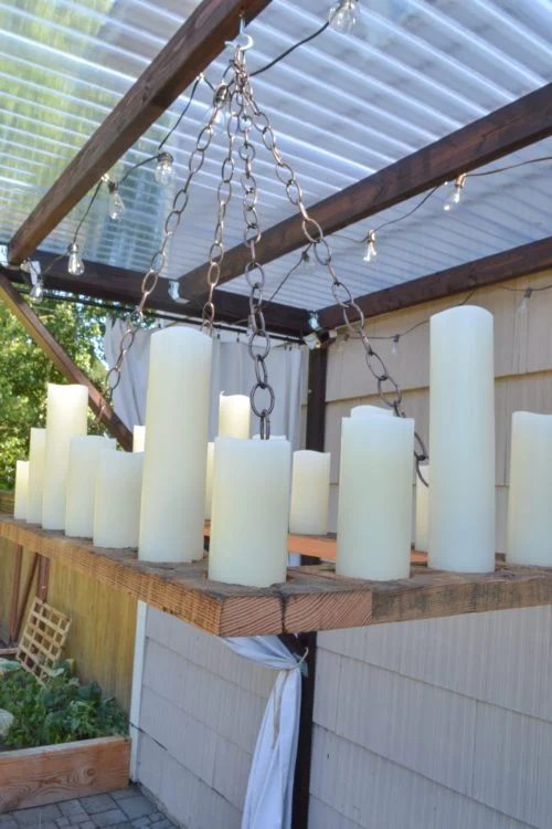 9 Remote Control Candles, Reclaimed Wood And Chains Make A strong Outdoor Chandelier, By The Creative Home Featured On @Bekob