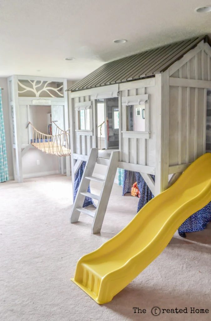 The Created Home Cabin Playroom With Rope Bridge And Climbing Wall