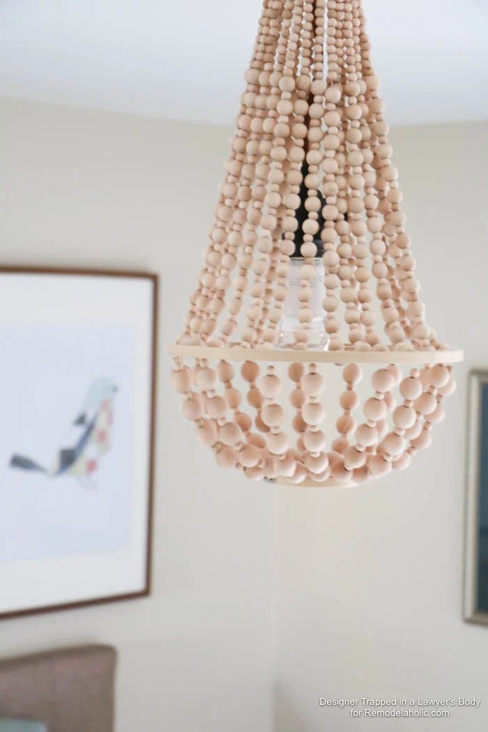 WOW! Come learn how to make your own wood bead chandelier with this solid walkthrough by Designer Trapped in a Lawyer's Body for Bekob.com!