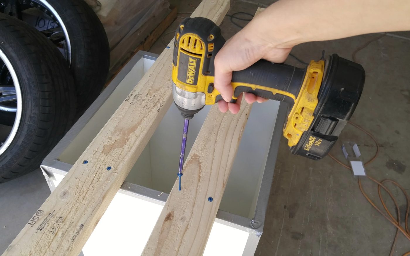 attaching-cross-support-handmade-tall-concrete-planter