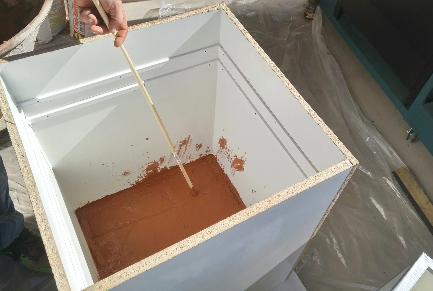 tamping-handmade-tall-concrete-planter