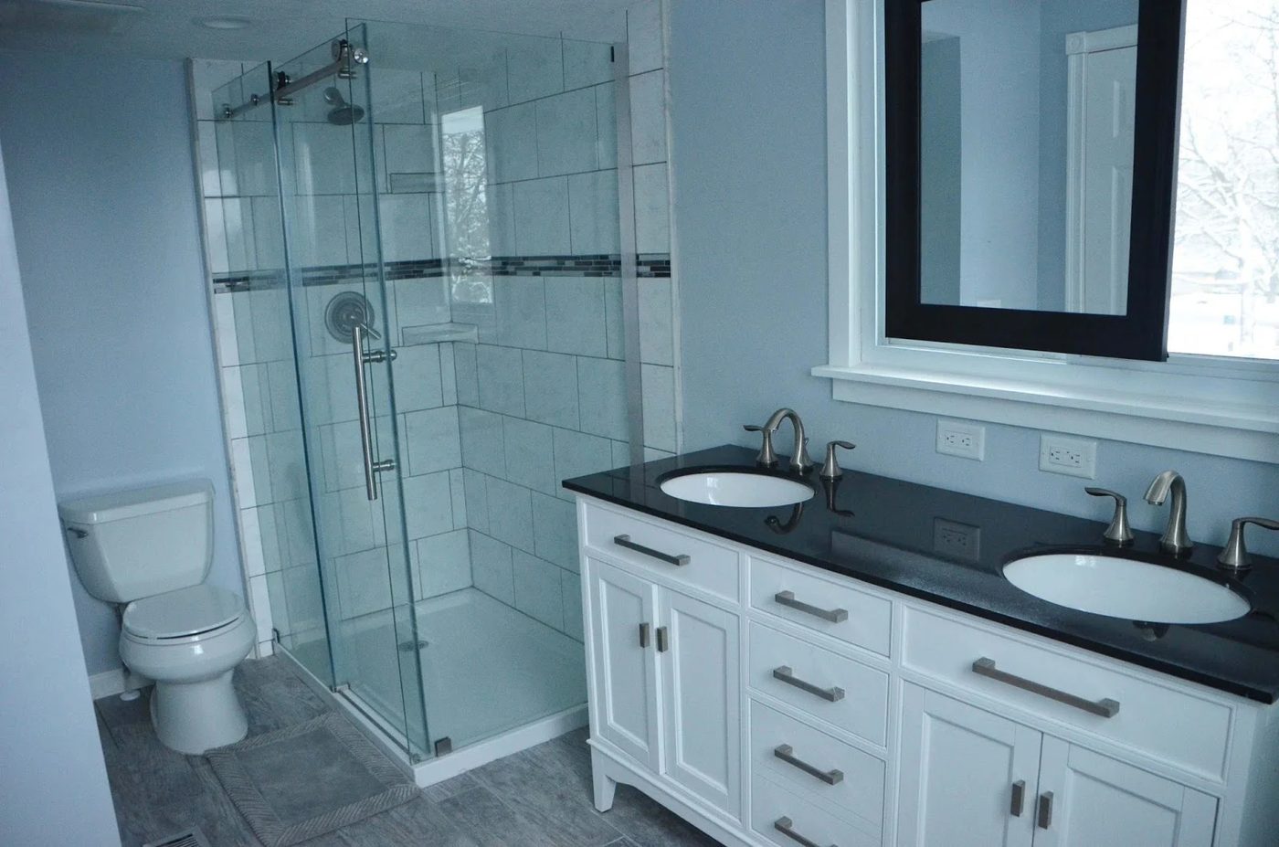 Master Bath Renovation, dark vanity countertop, sliding mirror, by Since I Became a Mom featured on @Remodelohic