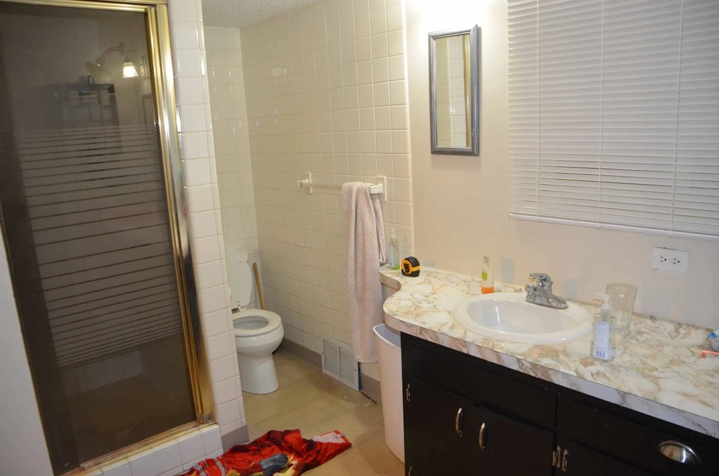 Before Master Bath Remodel with Sliding mirror across a window, before, by Since I Became a Mom featured on @Remodelohic