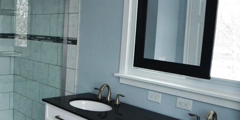 Master Bathroom Renovation with Sliding Mirror Over the Window
