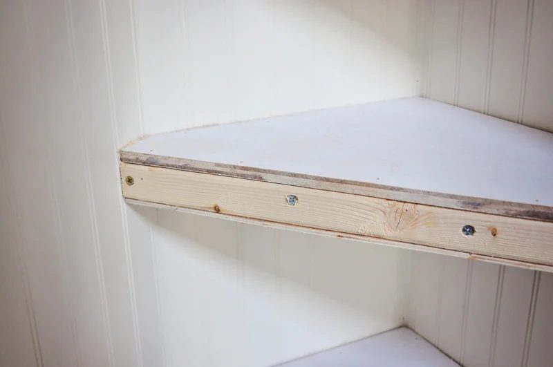 corner floating shelf with top and bottom installed