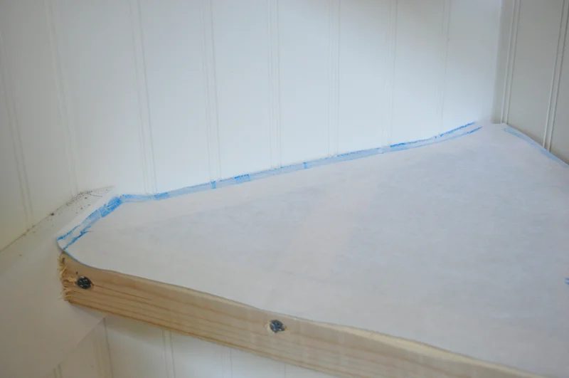 creating shelf template for odd and irregular shaped corner floating shelves in a hall closet organization project