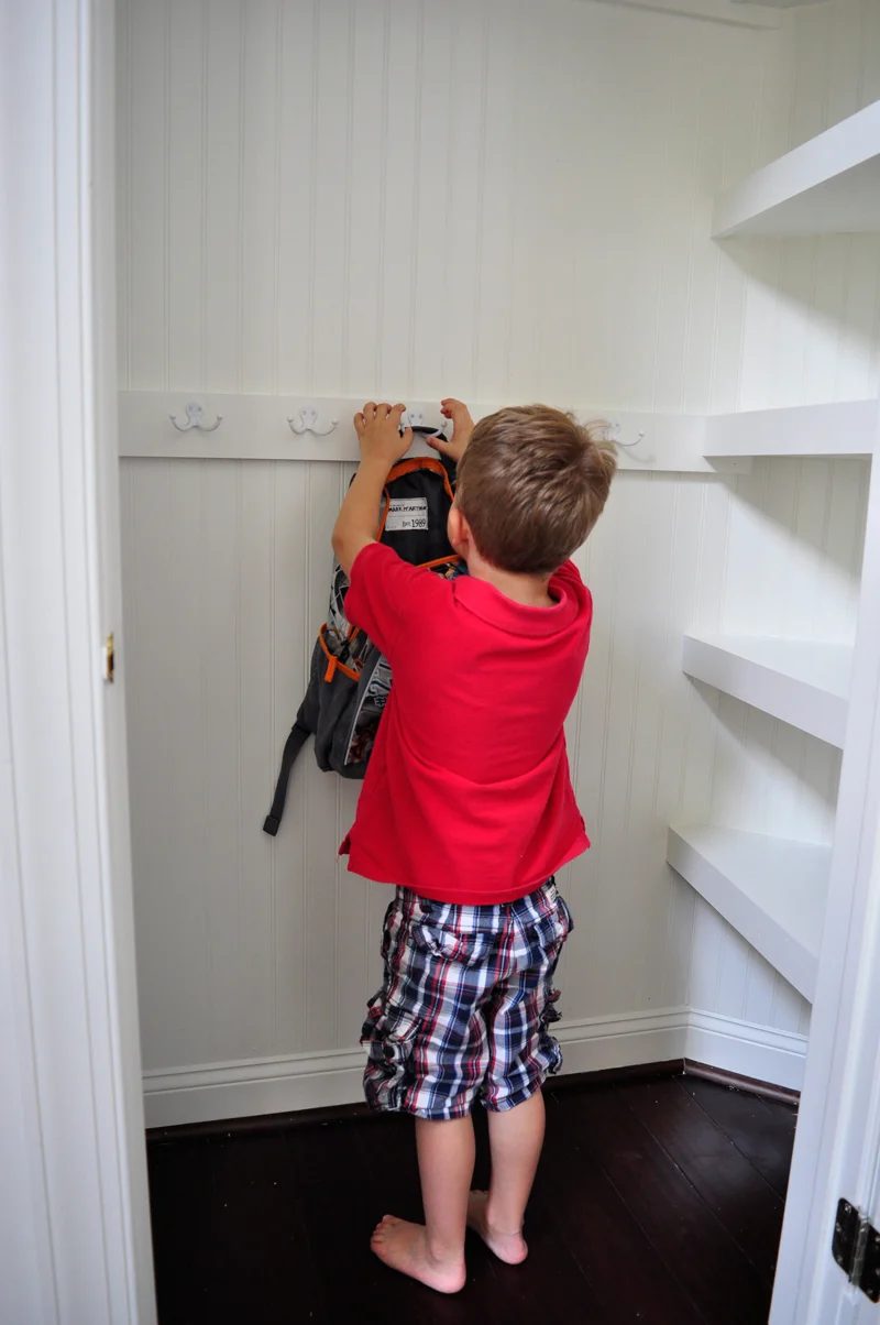 kid-friendly hall closet organization and storage space