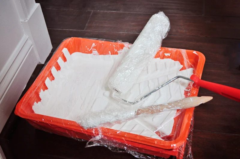 wrap paint roller and paint brush with plastic wrap to prevent drying out while painting