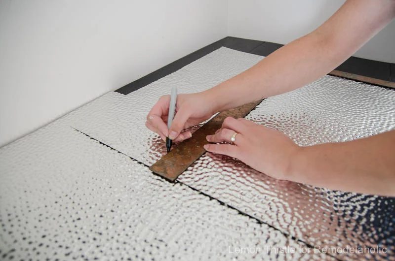 How to install a metal (steel) ceiling tile backsplash