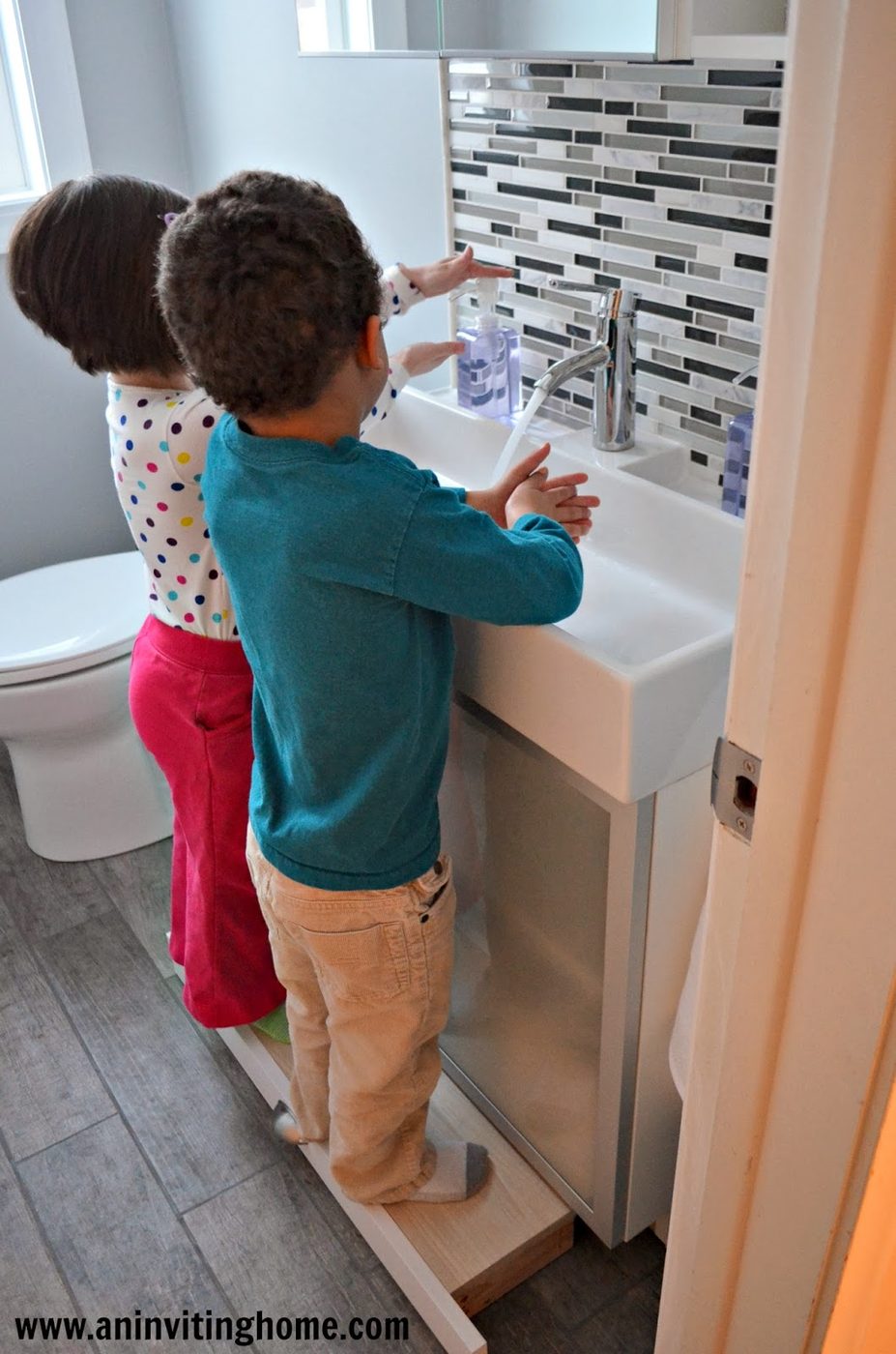 modern bathroom with built-in vanity step stool, An Inviting Home on Bekob