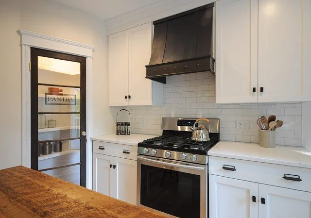 8 Custom Range Hood, Glass Pantry Door And Reclaimed Wood Countertop In Renovated Kitchen, By SoPo Cottage Featured On @Bekob